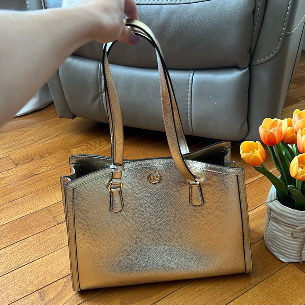 Michael Kors gold color bag on shoulder. Brand new